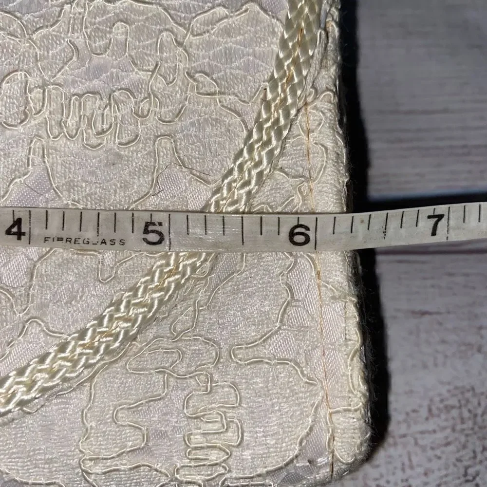 La Regale LTD vintage lace clutch w/nylon chord strap & fringe tassle white